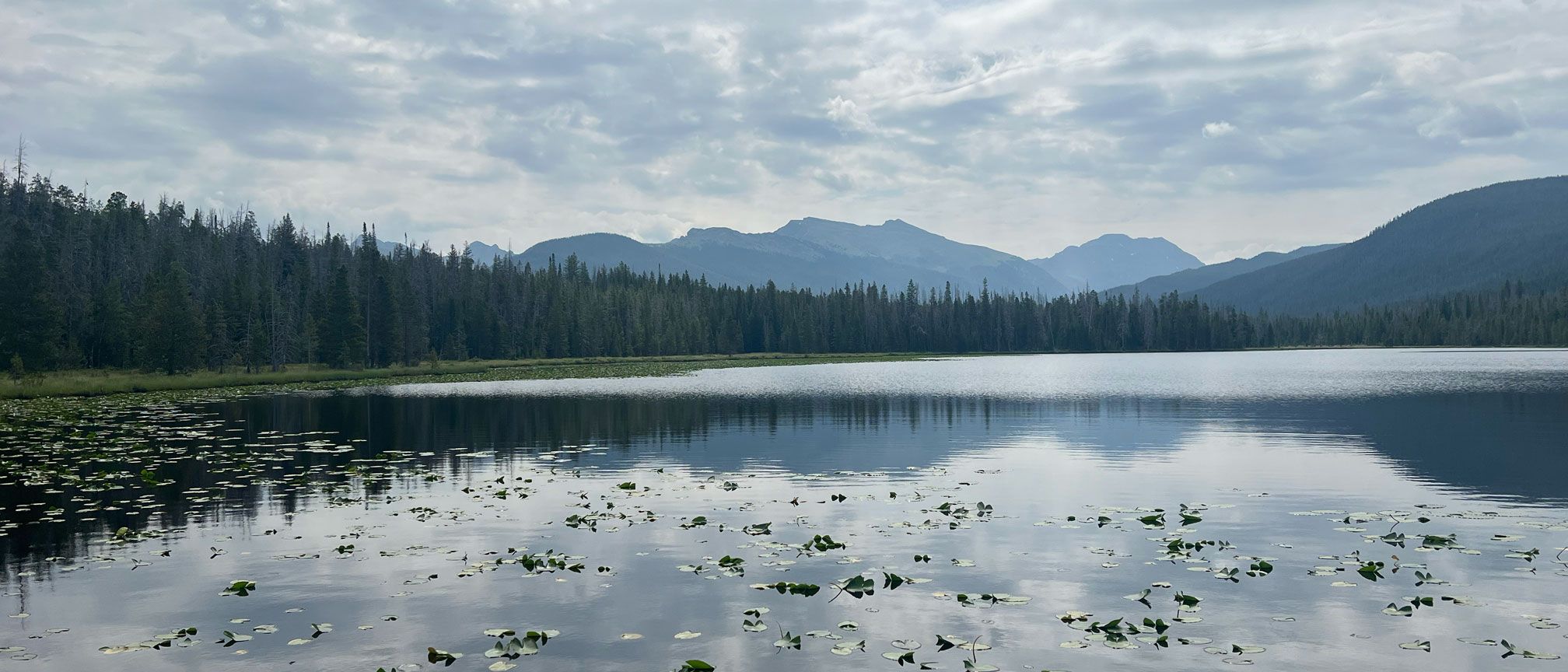 lake view with mountains in the distance